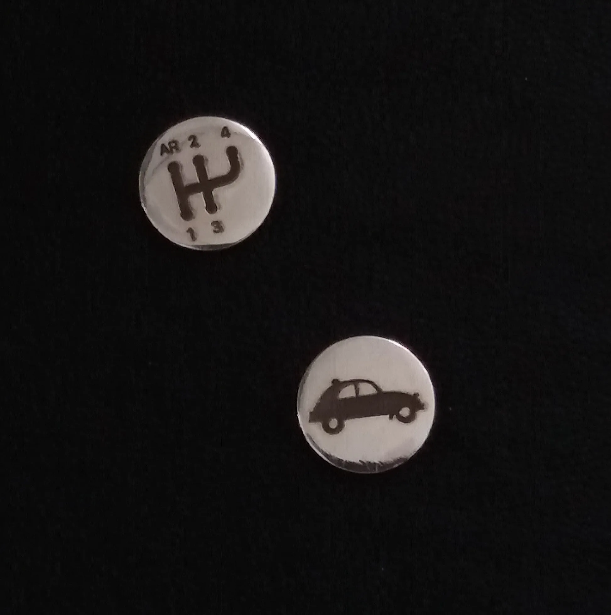 Gear shift pattern earrings